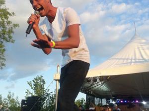 Tyler Williams performing at the Olde Time Country Fair in 2013