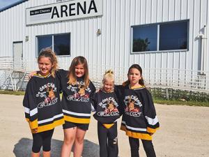 Hockey players Amelie Fontaine, Josee d'Auteuil, Evangeline Golding, Emma Vincent