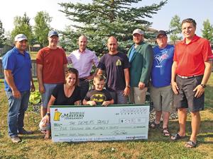 Back Row: Steve Fast, Stan Hiebert, Tyler Wiebe, Pierre Demers, Collin Funk, Joel Martens, Ray Dowse. Front Row: Courtney & Gavyn Demers