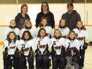 Back Row: Kristy Peters (manager), Sarah Arnal (coach), Dan DeRocquigny (assistant coach) Middle Row: Mallory Wallace, Kara DeRocquigny, Gracie Peters, Mya Arnal, Macy Wallace. Front Row: Brinley Harder, Talia Raine, Ava Sinclair, Jill Loeppky, Bella Austman