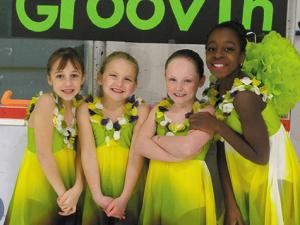 Zoe Bardal, Willa Dowse, Elizabeth Huddleston, and Miqaela Olatundun of the Star Synchro Team.