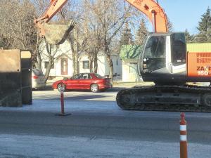 Excavation underway on Main Street to repair a sewer connecting line