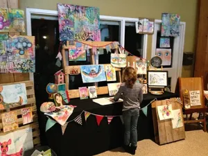 This Little Light Artistry's booth at the 2015 showcase