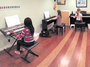 Children take part in Laura Visser's Music for Young Children program