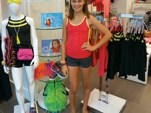 Maddie Thompson alongside her creations at Triple Flip in Winnipeg