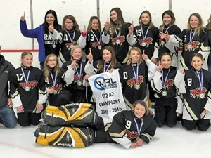 The Red River Rage U12 team celebrates winning gold