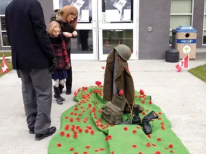 Attendees pay respects following the ceremony