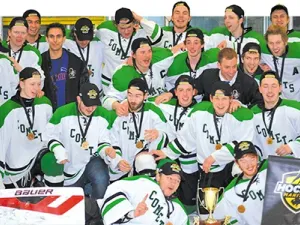 The Comets celebrate their champion win