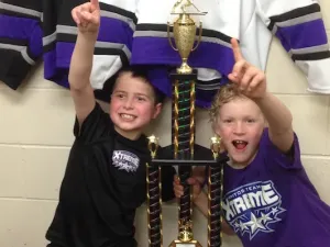 Tristan Cousineau and Max Dowse celebrate with their first place trophy