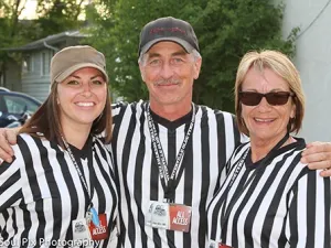 Fair organizers Danielle Tkachyk, Jeff Stott, and Elaine Krahn