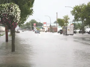 A flash flood on August 29, 2015 covers Main Street from curb to curb