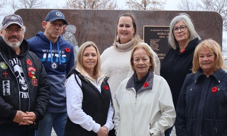 Back row: Wes Bonkowski, Natalie Batkis, and Louise Hiebert. Front row: Randy MacDonald, Laurie Stott, Elaine Krahn, and Lora Wachtendorf. Missing: Donald Stott and Jason Kehler.