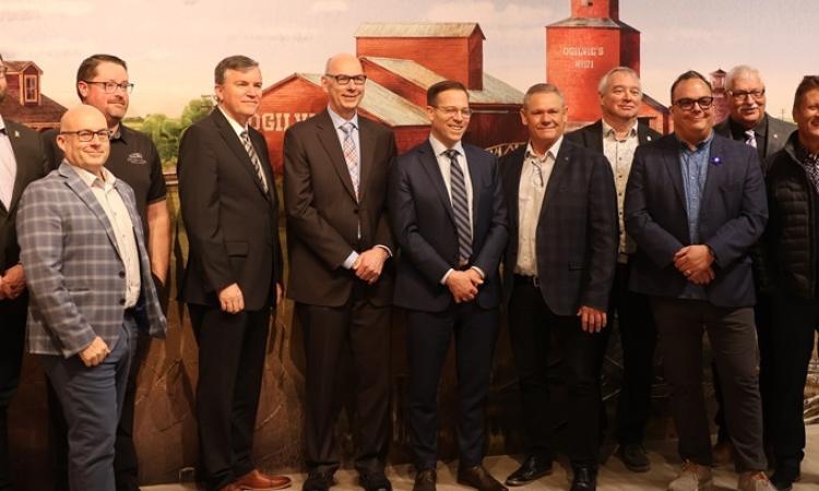 Dignitaries gather at the CRRC in Niveville for a major wastewater investment announcement.