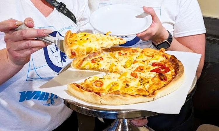 The Niverville Pizza Wars have officially begun.