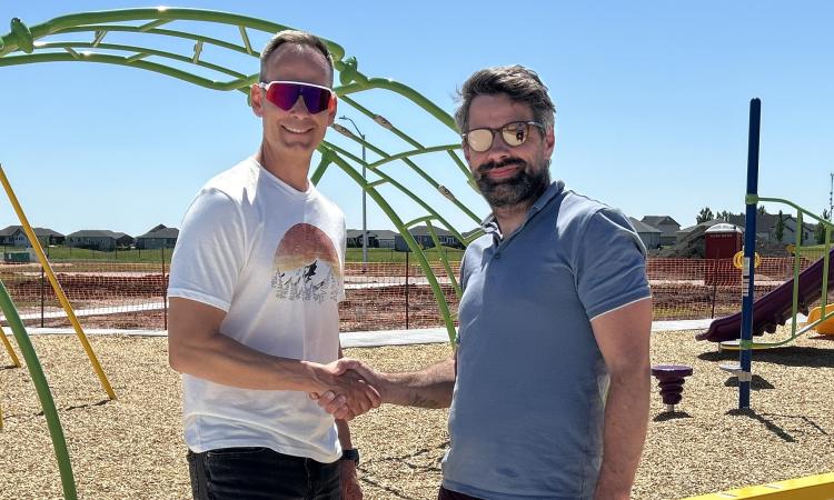 Len Peters and Warren Britton in Niverville's newest park.