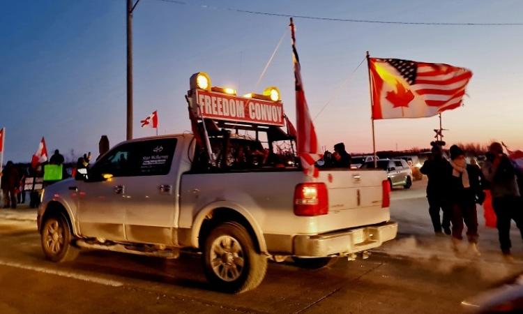 On Tuesday, January 25, crowds gathered at the Centre of Canada Park in the RM of Tache to show their support for a convoy of semi trucks and other vehicles making its way across the country in protest of a federal vaccination mandate for cross-border truckers.