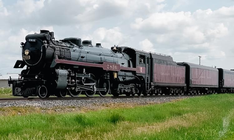 The Empress 2816, a 4-6-4 Hudson-type steam locomotive built in 1930, on its way through southern Manitoba.