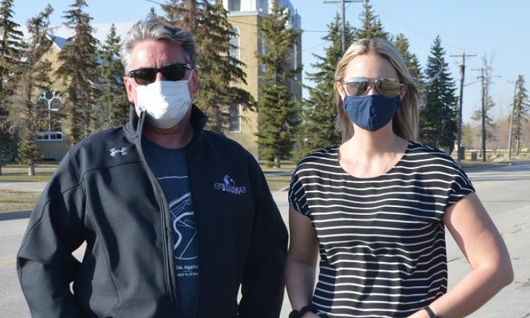 Ste. Agathe Community Development Inc. president Claude Lemoine and director Danielle Robert are seen on the streets of Ste. Agathe. The group hopes to get a Citizens on Patrol Program up and running in the community.
