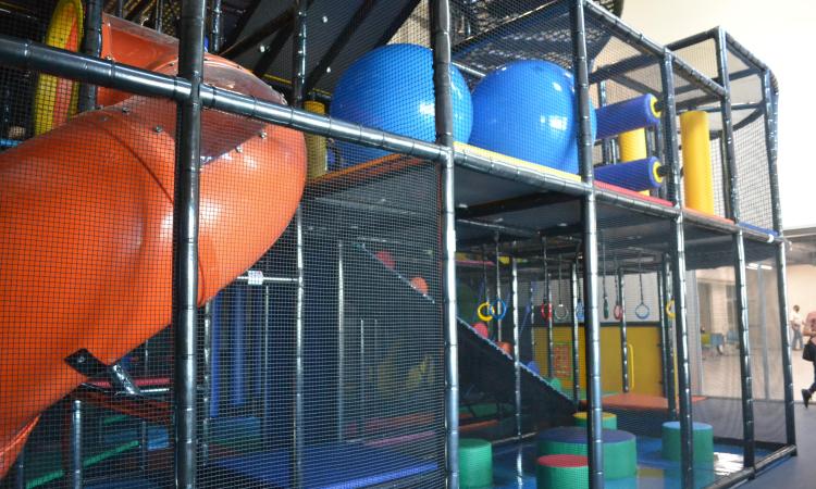 Another view of the indoor playground and its extensive play features.