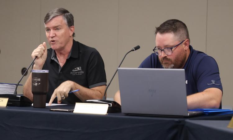 Niverville mayor Myron Dyck and CAO Eric King at a council meeting on August 8.