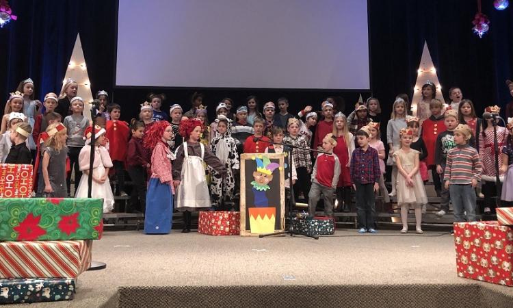 Grades One and Two students perform the Elementary School holiday show.