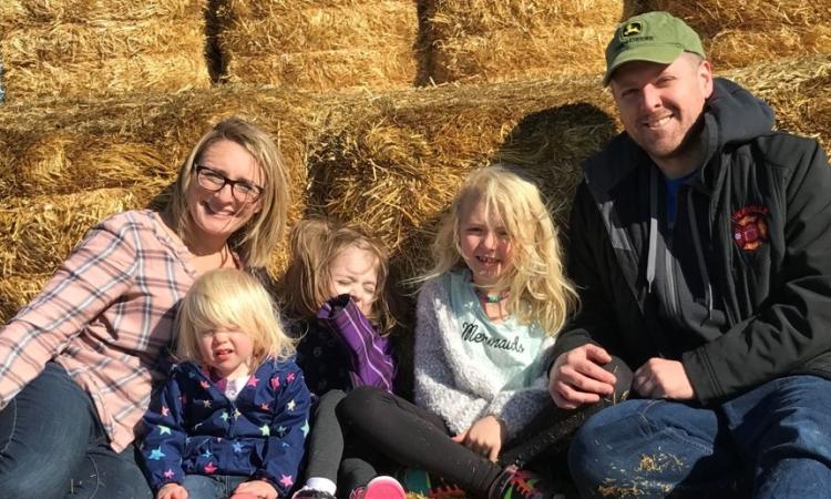 Garrett Hawgood with his wife Kate and three children.