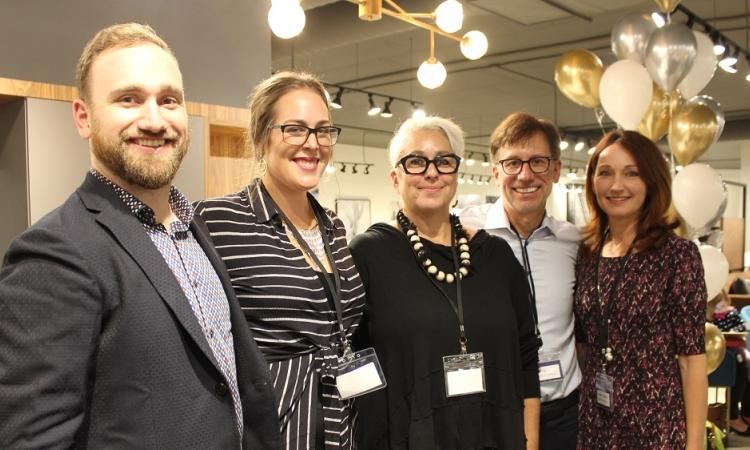 Dylan and Amanda Wiens, designer Carol Vellier, and Al and Ruby Wiens in the renovated Wiens Furniture showroom.