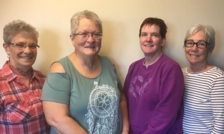 The Vintage Club executive team: Bev Baggley (chair), Sharon Burns (co-chair), Dena Fox (secretary), and Helen Mondor (treasurer).