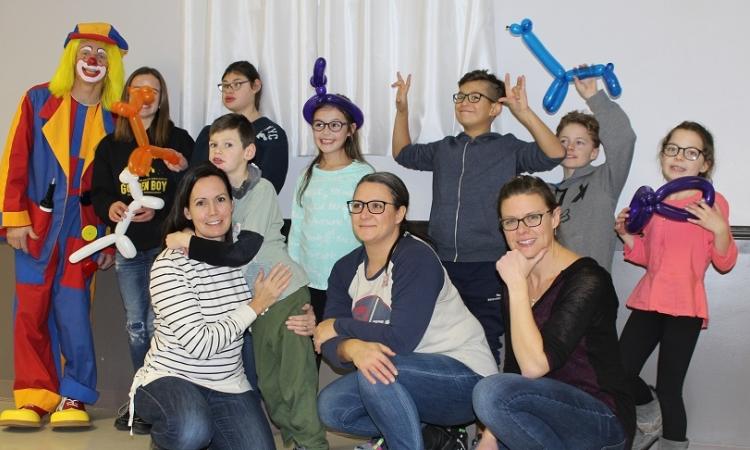 MoveNGroove participants at their annual birthday party, with organizers Laurie Loeppky, Lisa Sakwi, and Leah Dyck.