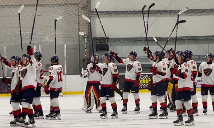 The Nighthawks celebrate victory.
