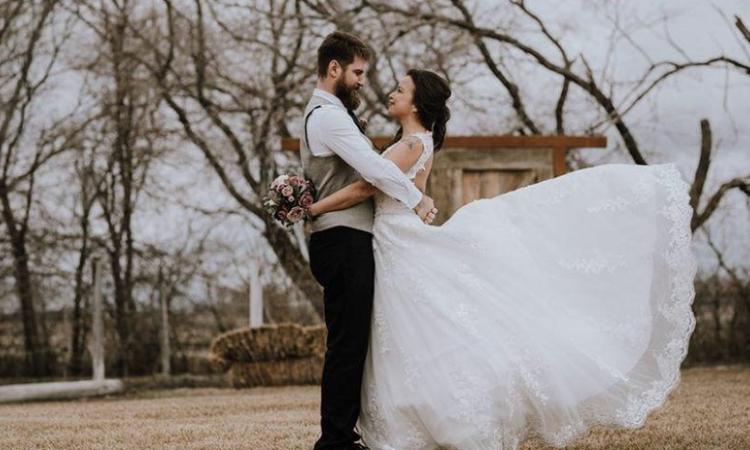 Darryl Wolfe and Becky Mentuck at their smaller-than-intended wedding in April.