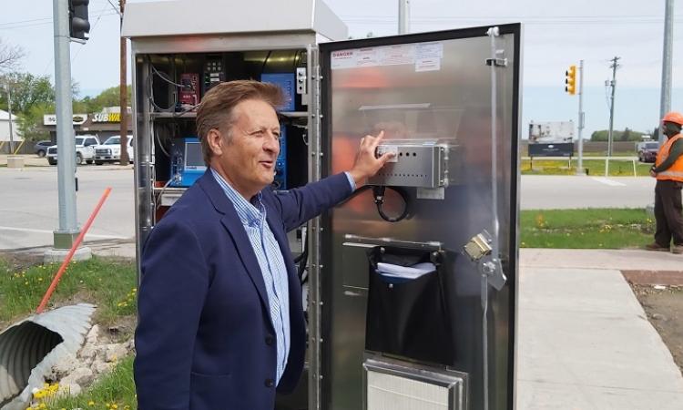 The moment when Ron Schuler flicked the traffic signals into operation for the first time.