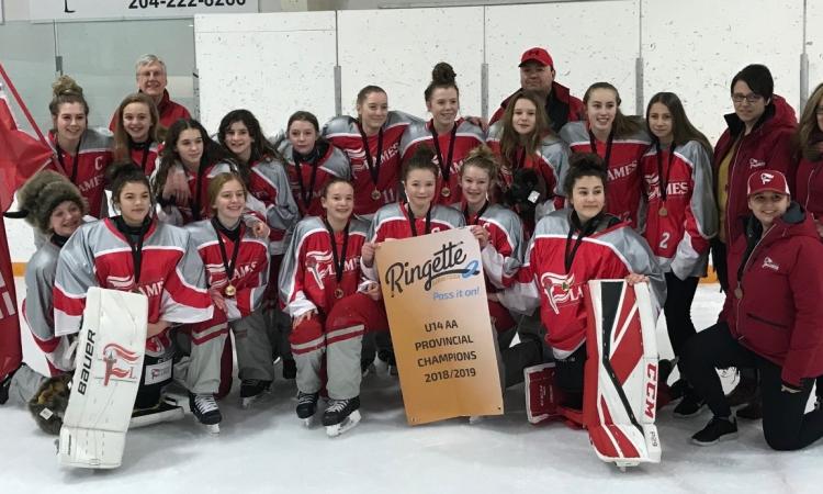 The U14 Eastman Flames, including players from Niverville and Ste. Agathe, are Provincial champions.