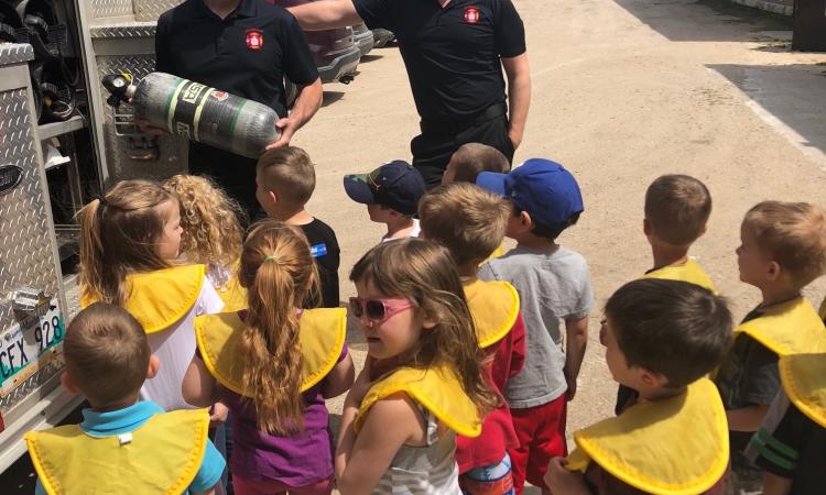 Firefighters give Niverville preschoolers a tour of the town’s fire engine.