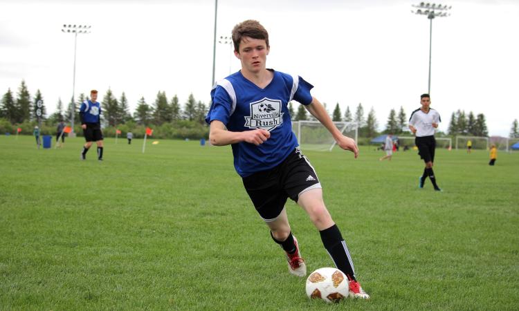 Elijah Pastoor doing what he loves—playing soccer at the highest level possible.