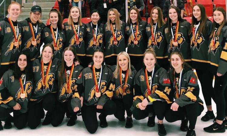 Team Manitoba with their bronze medals.