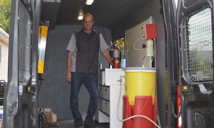 Emile Jolicoeur stands ready in the Freedom Fire mobile unit.