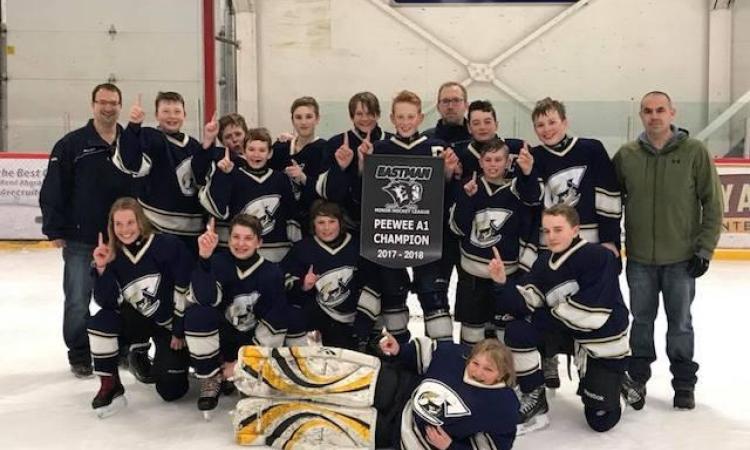 Back: Cam Funk (coach), Landon Nickel, Cole Kwiatkowski, Cole Williams, Caiden Britten, Evan Groening (captain), Al Ouimet (coach), Finley Nurse, Noah Ouimet, and Steve Wolski (coach). Front: Hailey Claydon, Carter Kenning, Joshua Smeltz, Logan Wolski, Derek Plett, and Jace Woytowich (goalie).