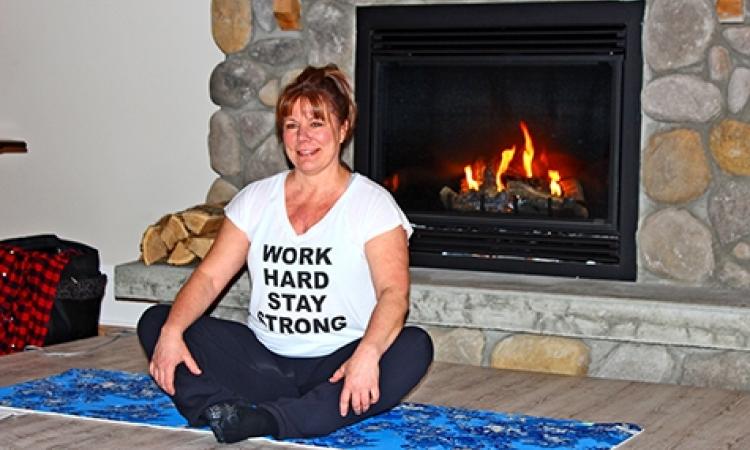 Yoga instructor Janice Burnett in the great room at Whitetail Meadow