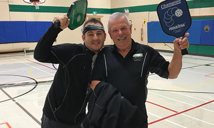 Ritchot Mayor Chris Ewen and Councillor Jeannot Robert show off their pickling skills