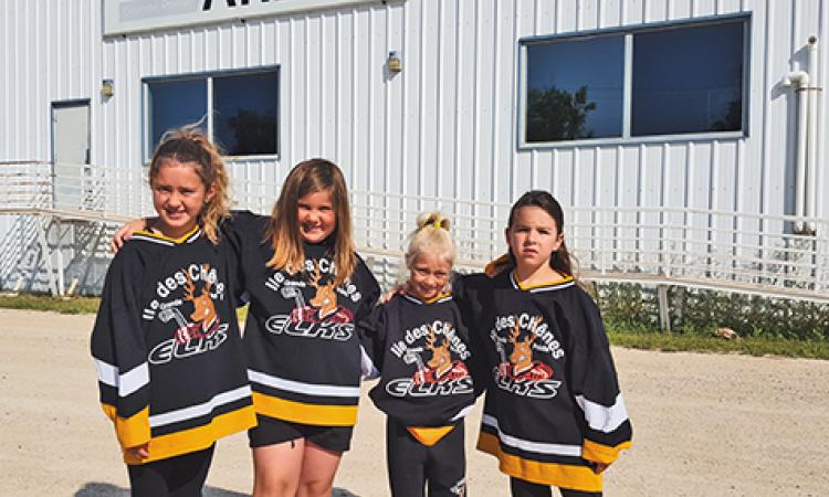 Hockey players Amelie Fontaine, Josee d'Auteuil, Evangeline Golding, Emma Vincent