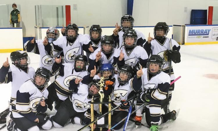 The Atom A Clippers celebrate their victory