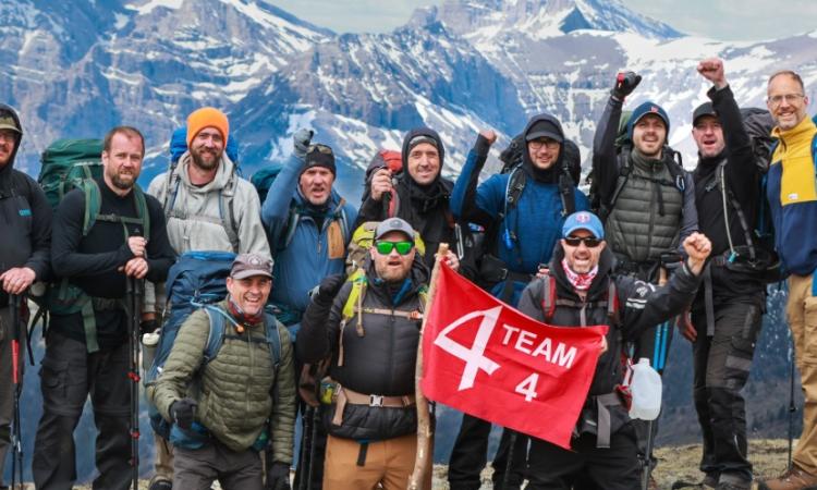 Doug Dyck celebrates with the rest of his 4M hiking group.