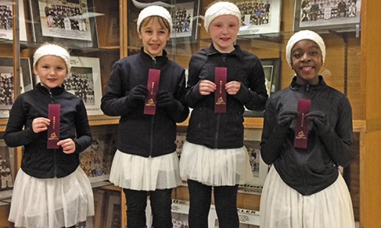 Willa Dowse, Zoe Bardal, Elizabeth Huddleston, and Miqaela Olatundun with their bronze ribbons