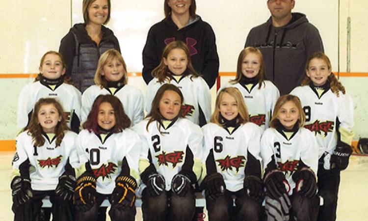 Back Row: Kristy Peters (manager), Sarah Arnal (coach), Dan DeRocquigny (assistant coach) Middle Row: Mallory Wallace, Kara DeRocquigny, Gracie Peters, Mya Arnal, Macy Wallace. Front Row: Brinley Harder, Talia Raine, Ava Sinclair, Jill Loeppky, Bella Austman