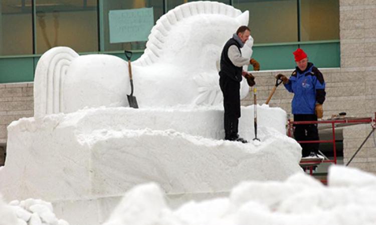 Gary Tessier and Real Berard sculpting the "Toy Trojan Horse" in Ottawa