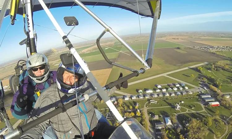 Barry Morwick takes a passenger for a tour over Steinbach