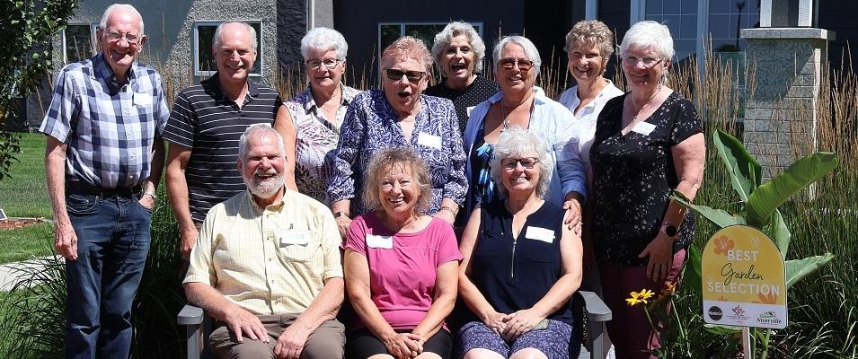 Communities in Bloom judges come to Niverville, meeting past and present local volunteers.