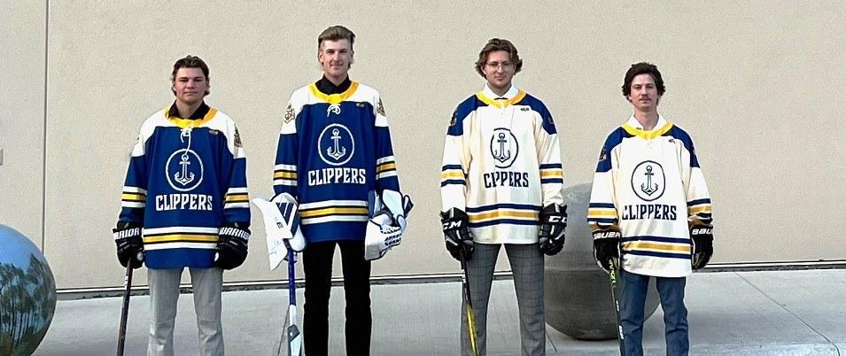 Junior C Clippers players Elijah Durksen, Nathan Rempel, Jaxsen Friesen, and Ethan Fehr show off this season's new jerseys.