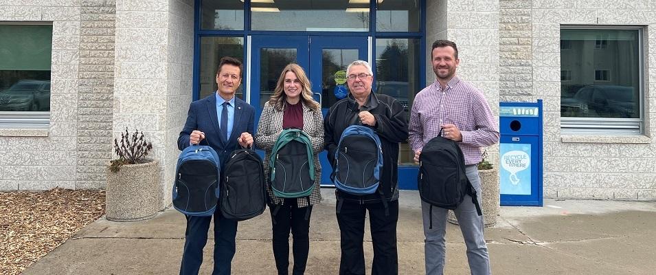 MLA Ron Schuler, Principal Shannon Philippe, Councillor Ron Mamchuk, and Vice-Principal Paul Grosskopf.